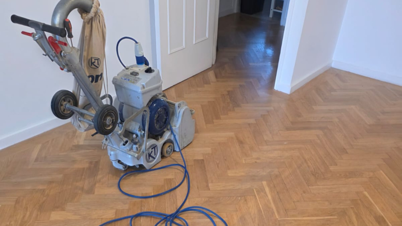 Wood Floor Sanding in Walthamstow on restored pine softwood floorboards, showing a bright, smooth finish in a light living room with patio doors.