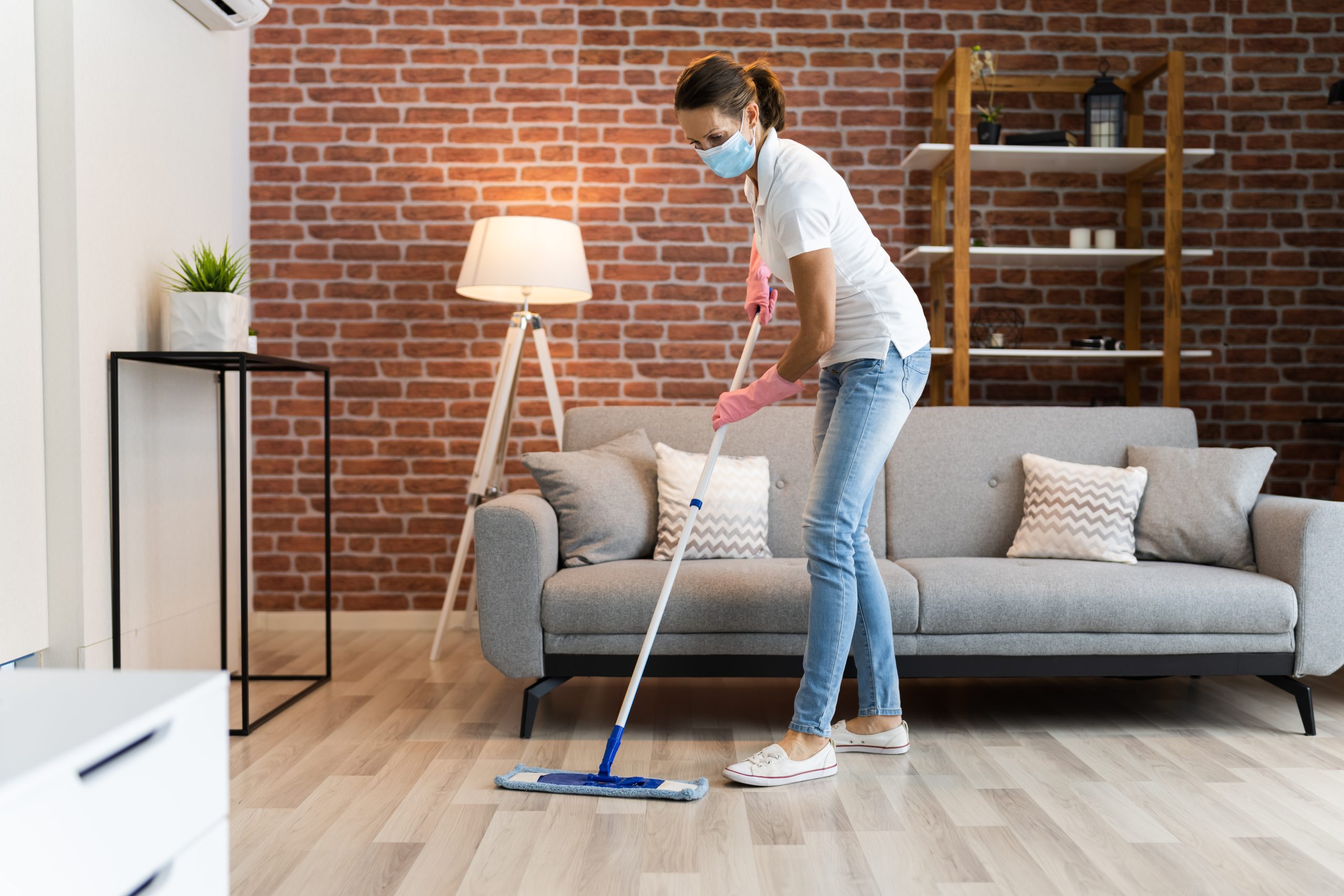 Hardwood Floor Refinishing in Walthamstow with aftercare cleaning on an engineered oak plank hardwood floor in a modern living room